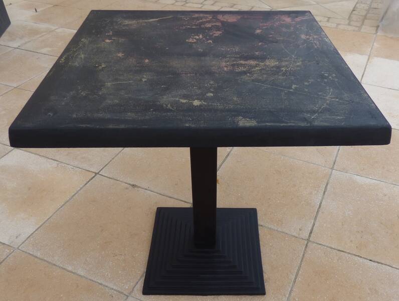 Vintage professional bistro table and its cast iron base