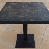 Vintage professional bistro table and its cast iron base
