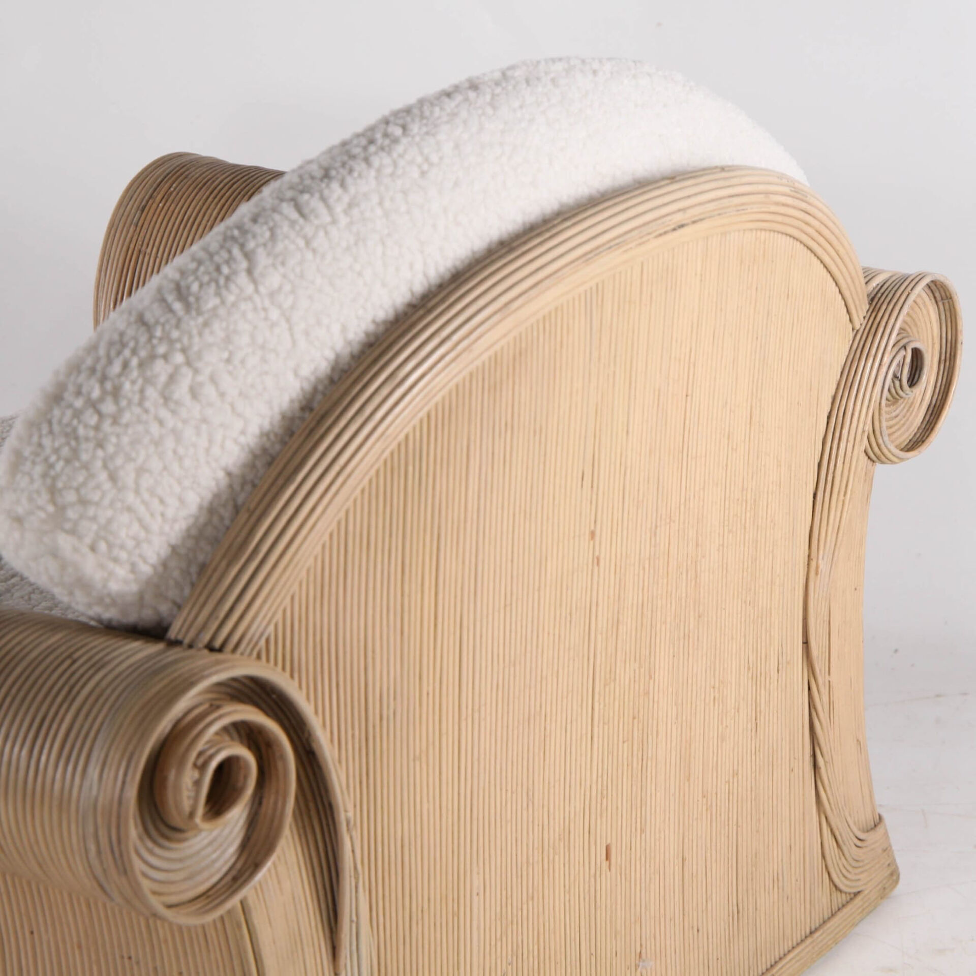 Rattan armchair by Betty Cobonpue