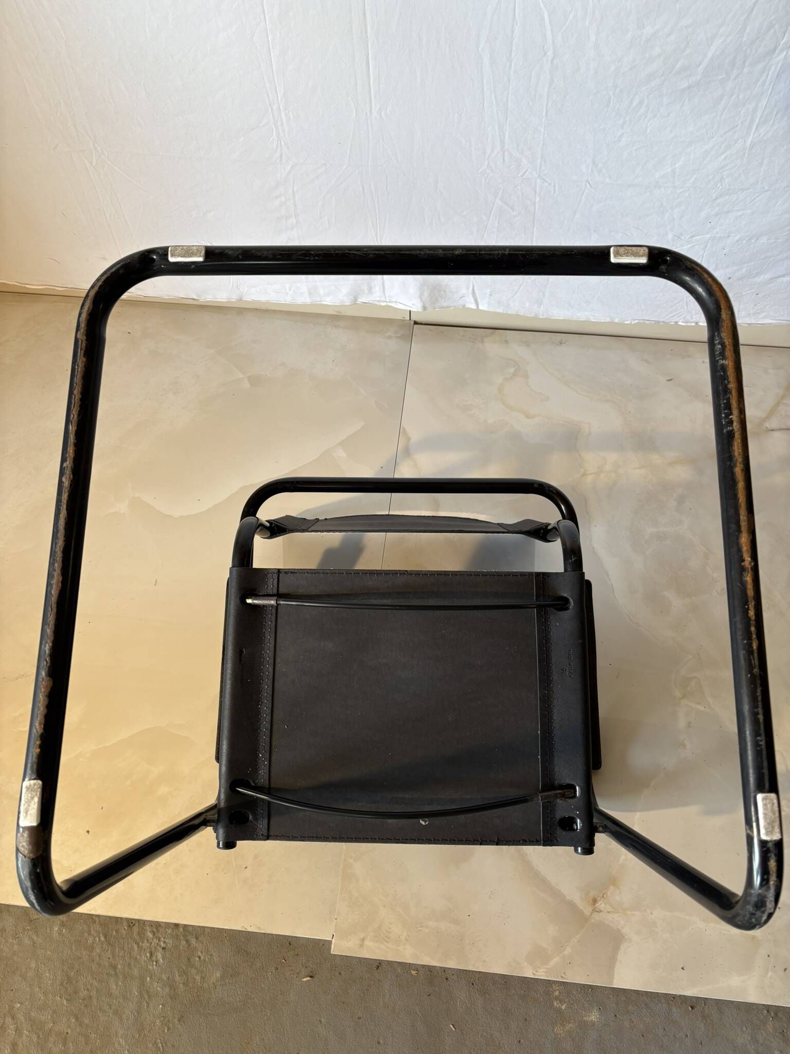 Set of 12 vintage black leather and tubular steel chairs – Italy, year