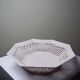Pale pink woven octagonal porcelain bowl, circa 1950.