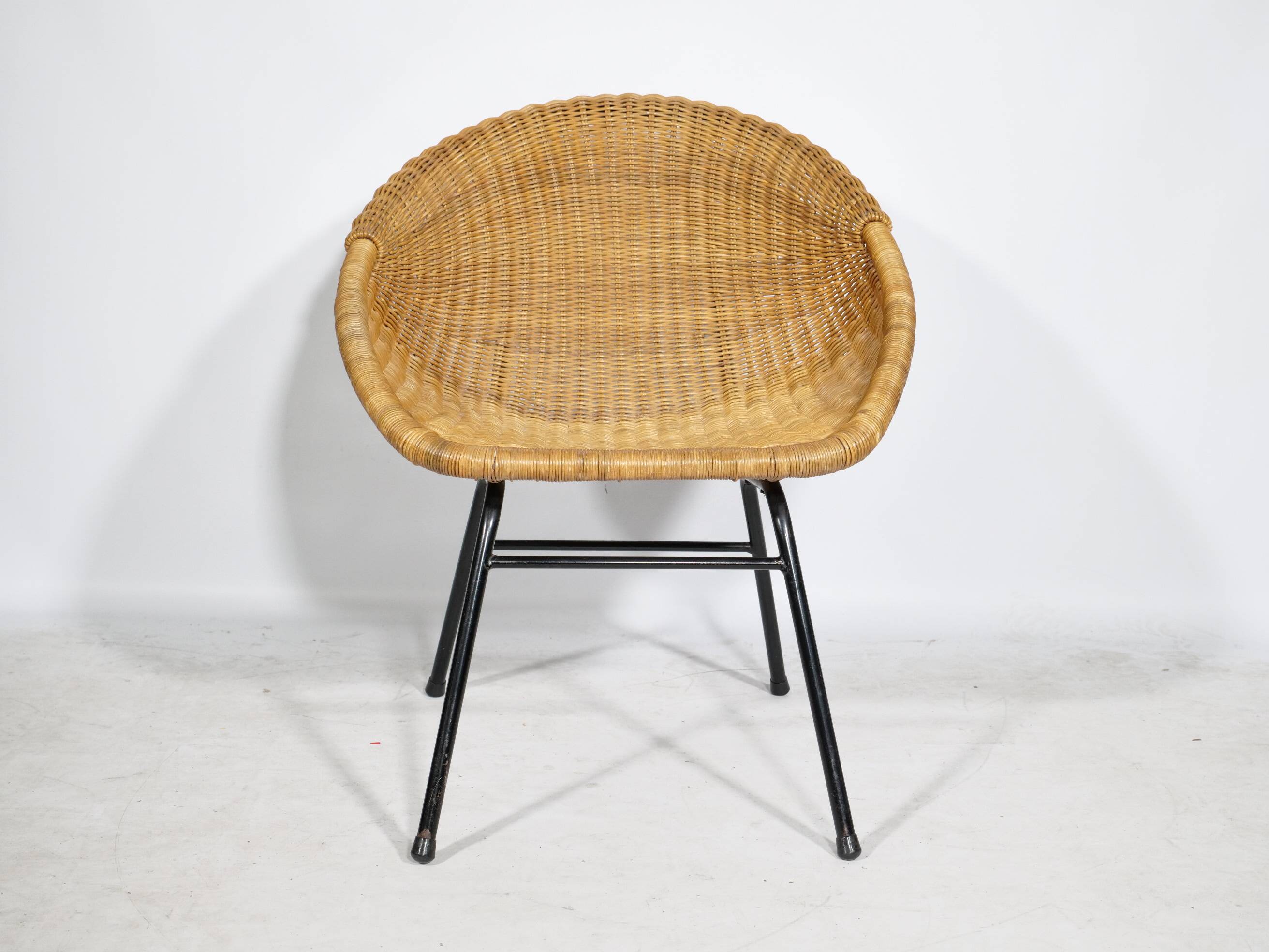 Woven rattan armchair from the 1960s