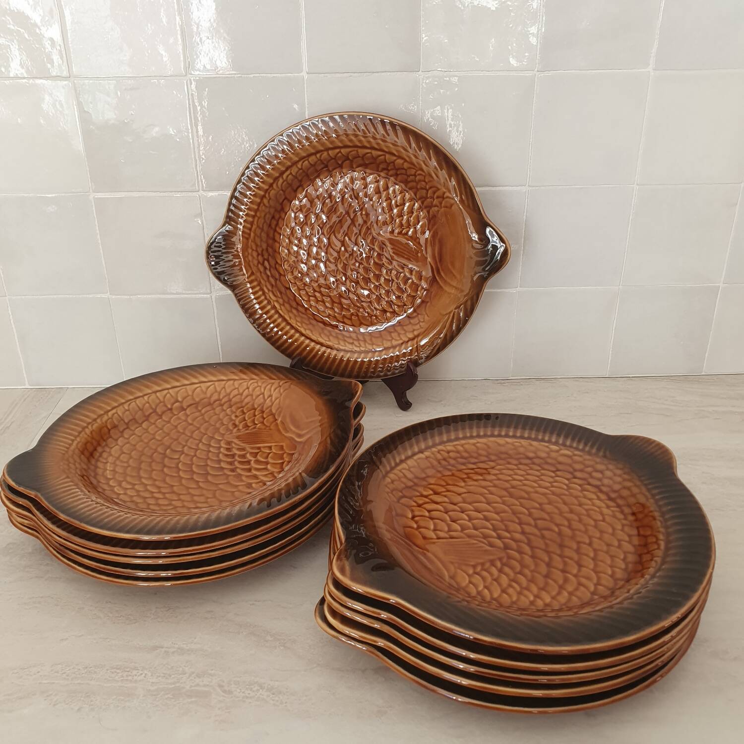Sarreguemines / 11 earthenware fish-shaped plates