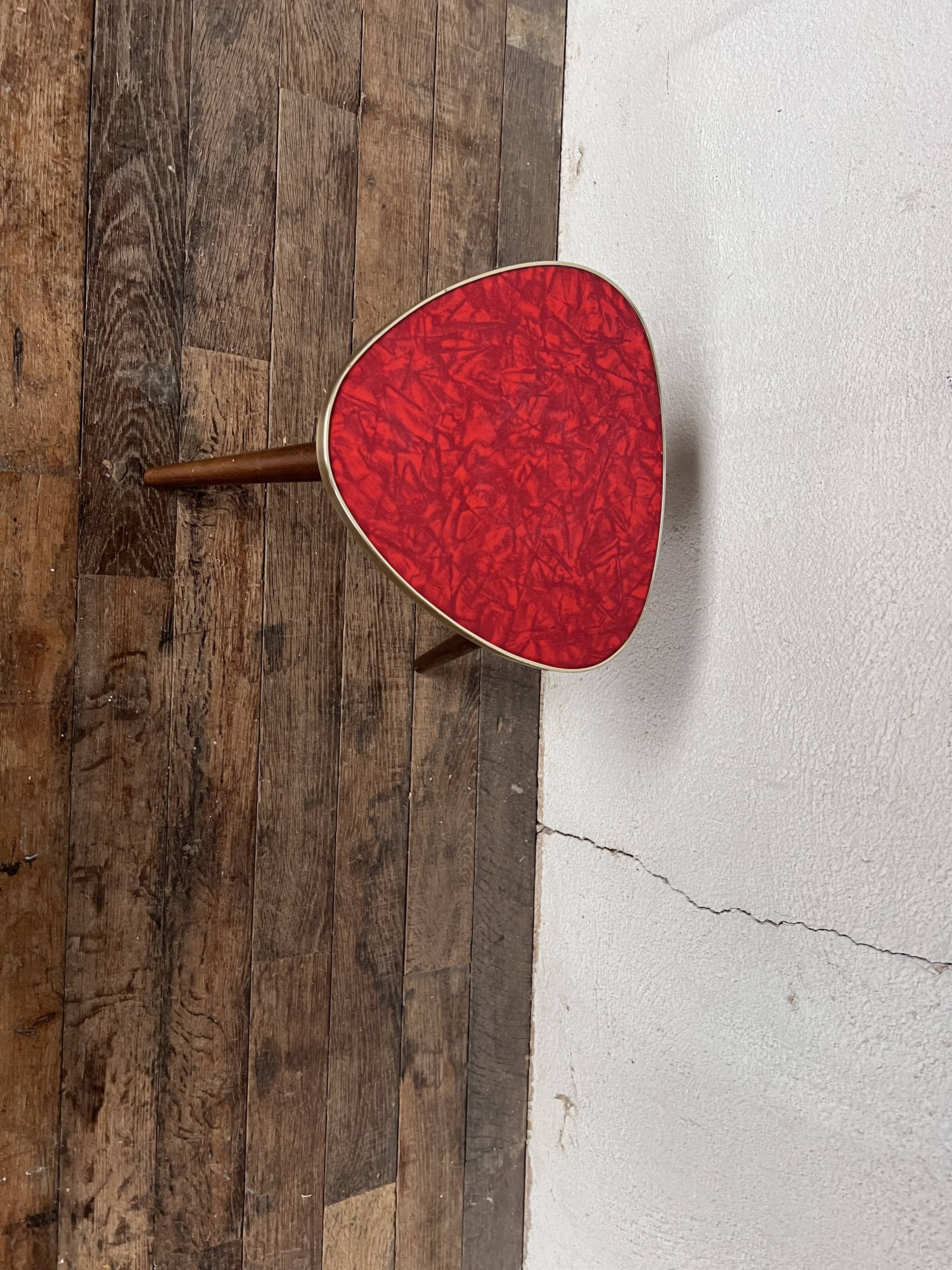 Triangular pedestal table small red table asymmetrical shape vintage tripod plant door