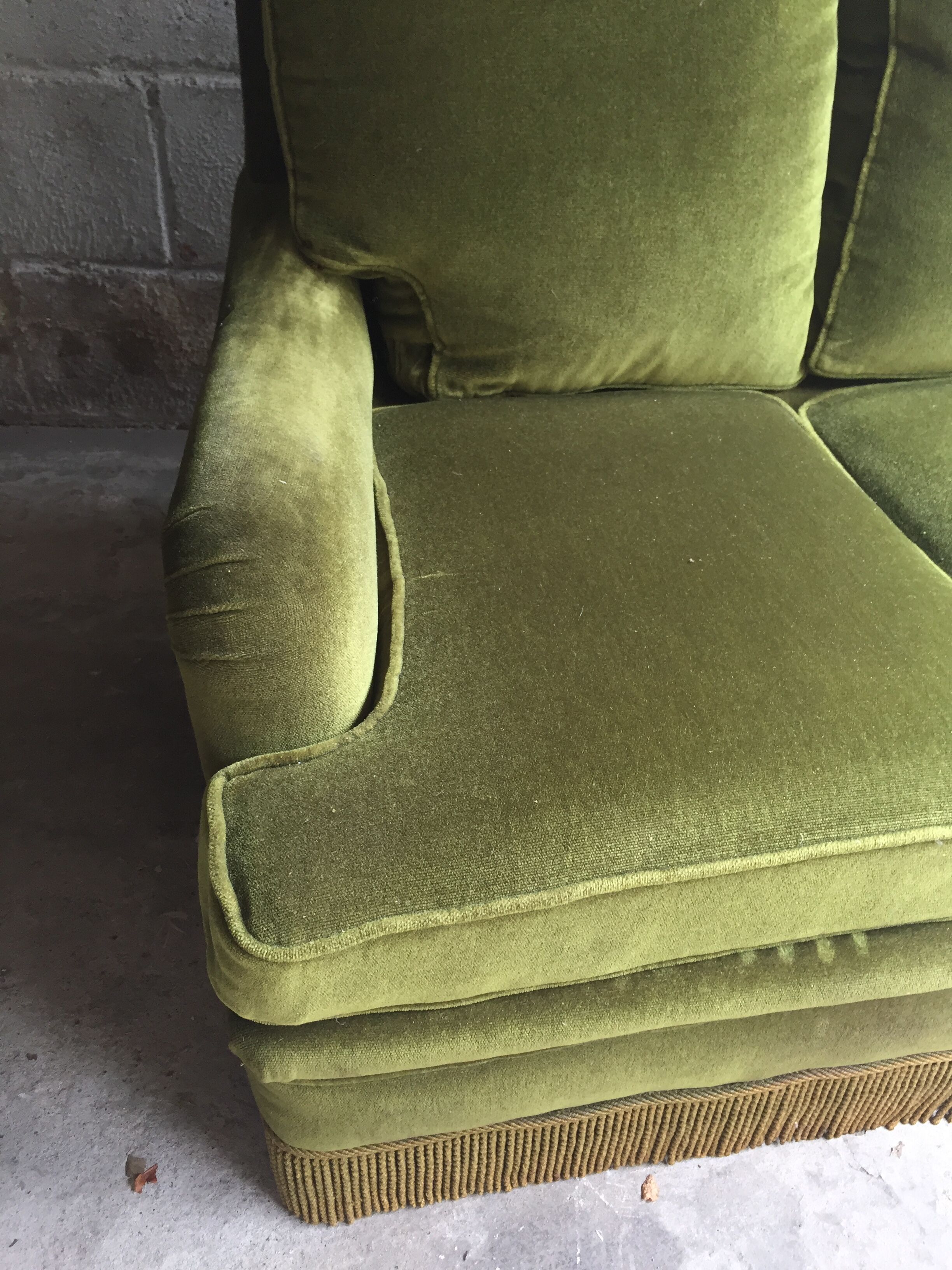 Vintage green velvet sofa