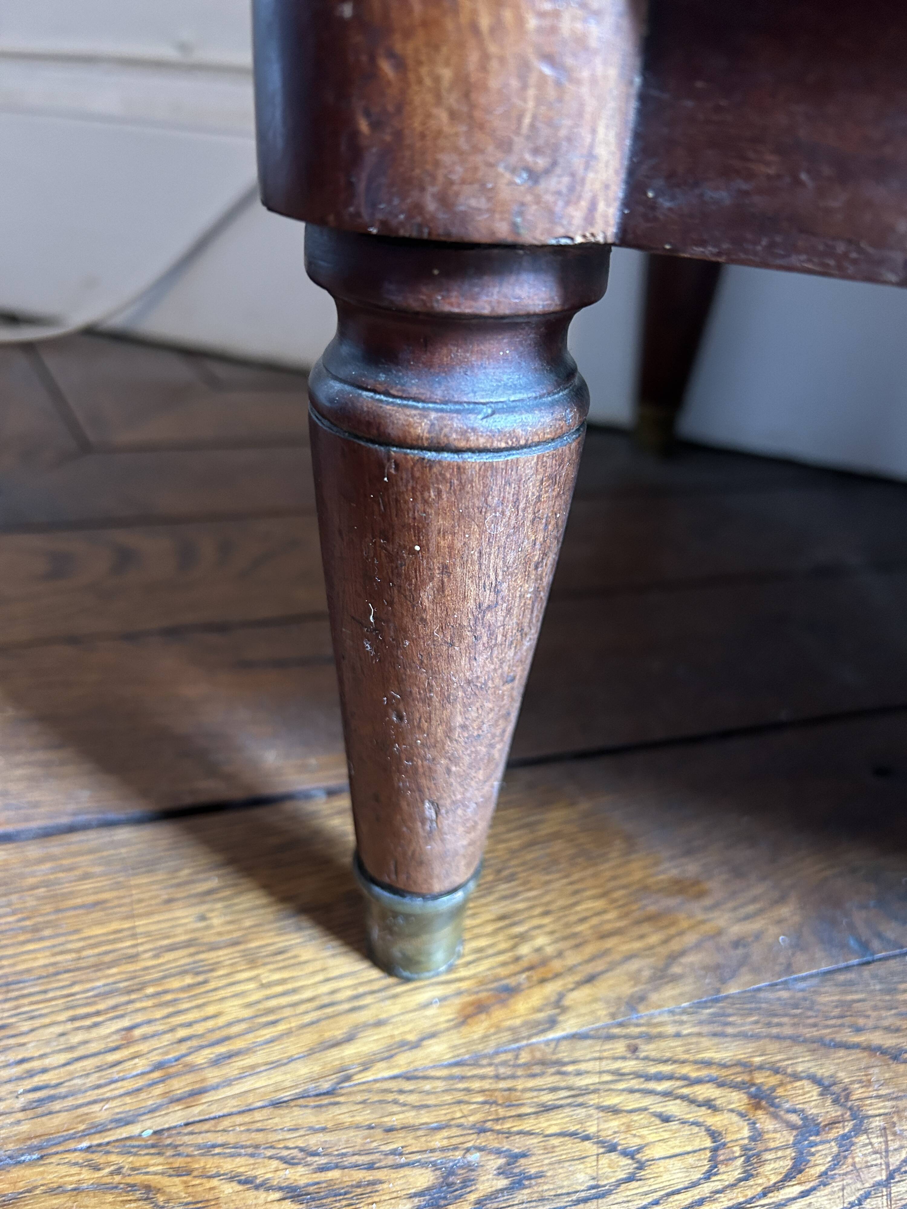 Mahogany and black marble chest of drawers, late 18th-early 19th century
