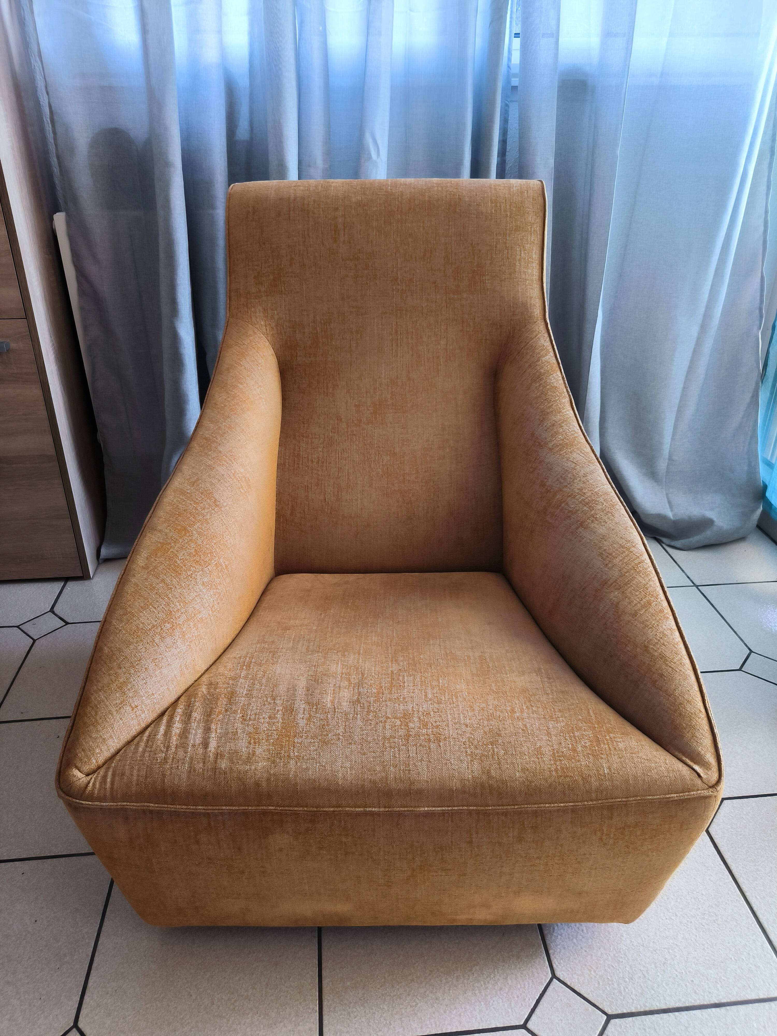 Doda armchair with armrests