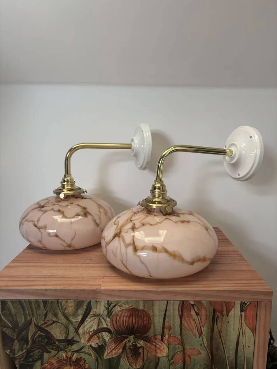 Pair of wall sconces in marbled opaline.