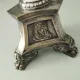 Old church candlestick in silver-plated metal