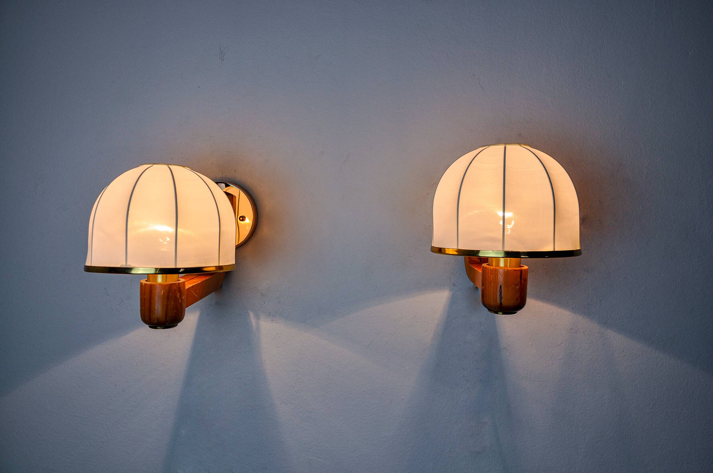 Pair of regency wall lights, pine and stretched canvas, Italy, 1970