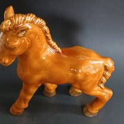 Ceramic horse sculpture with wild glaze and gold, signed Art Deco.