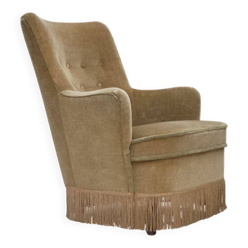 Fauteuil danois des années 1970, revêtement d'origine en velours vert clair.