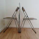 Trio of plexiglass folding chairs
