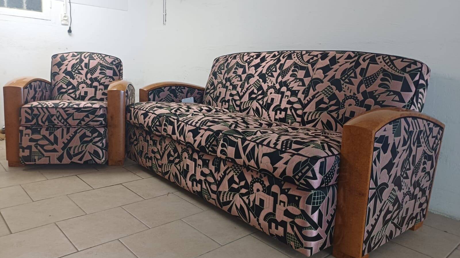 Convertible sofa and art deco armchair in lelievre fabrics.