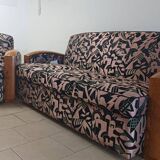 Convertible sofa and art deco armchair in lelievre fabrics.