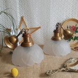 Pair of frosted glass flower pendant lights with vintage wood and brass