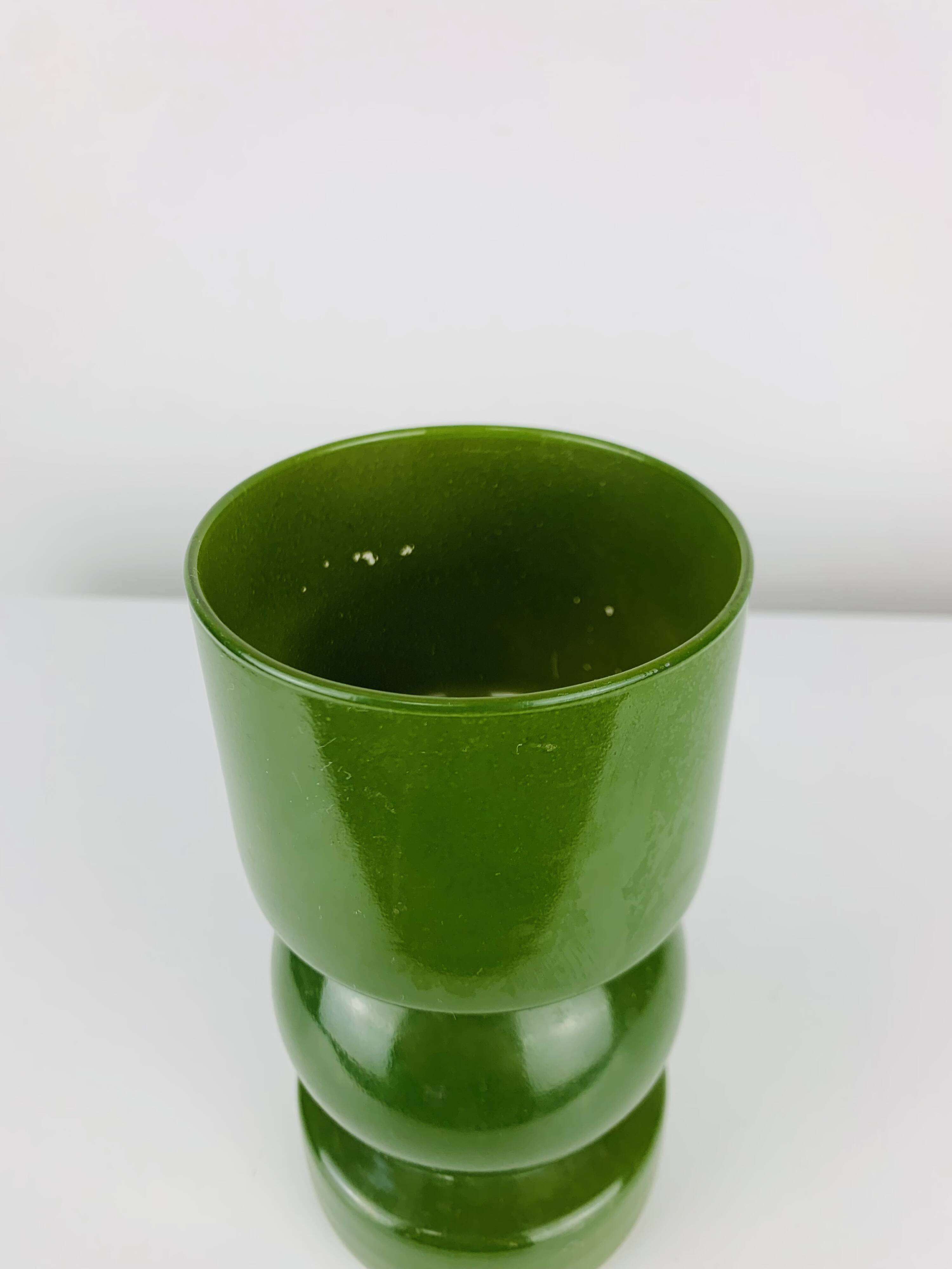 Green glass vase in Scandinavian style