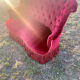 Small old Napoleon III toad sofa in red velvet