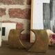 Pair of bronze candle holders by Monique Gerber