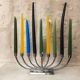 Large modern chrome metal candlestick for Hanukkah.