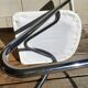 White faux leather sled chair