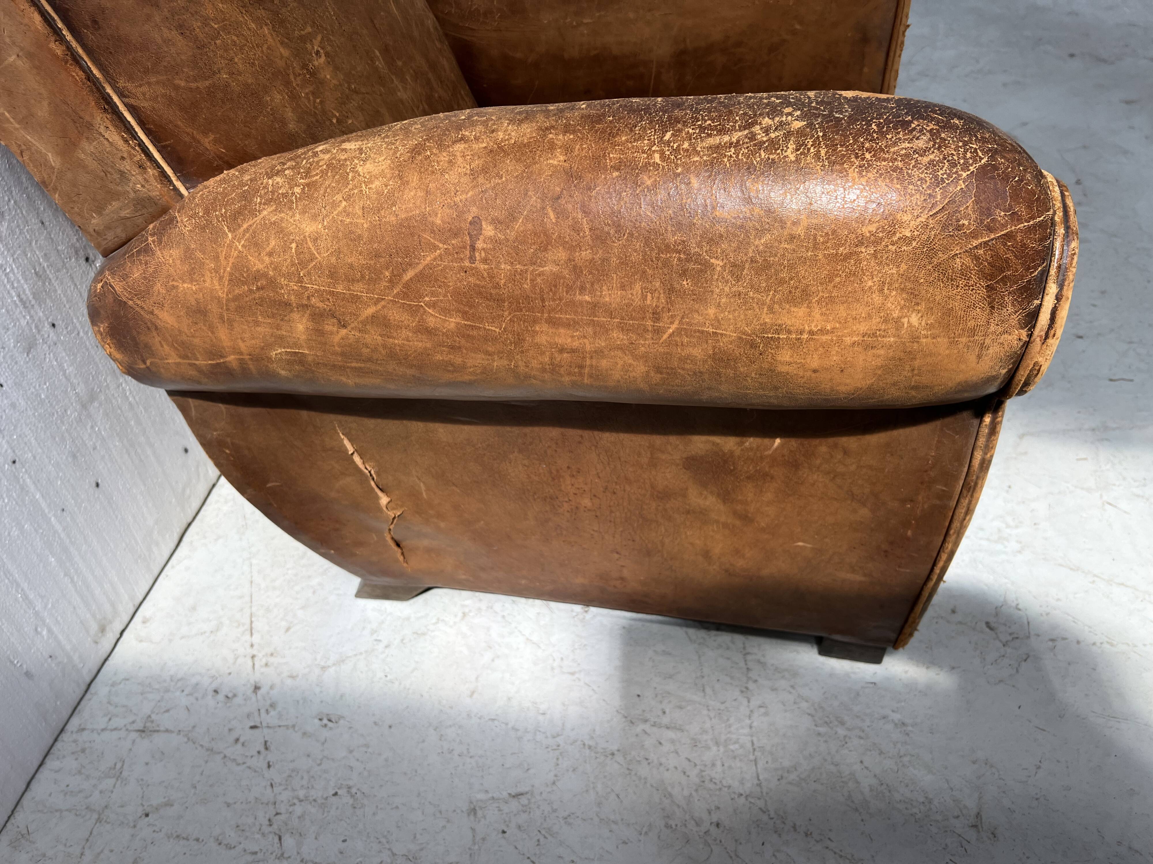 Antique 20th century tan leather club armchair