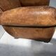 Antique 20th century tan leather club armchair