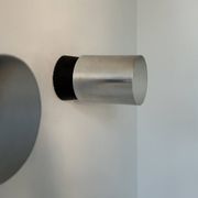 Pair of vintage wall lights, chrome-plated metal and Bakelite, France 1960.