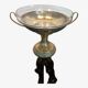 Art Deco brass cup and its engraved saucer.