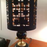 Lampe noire et or à décor de feuilles