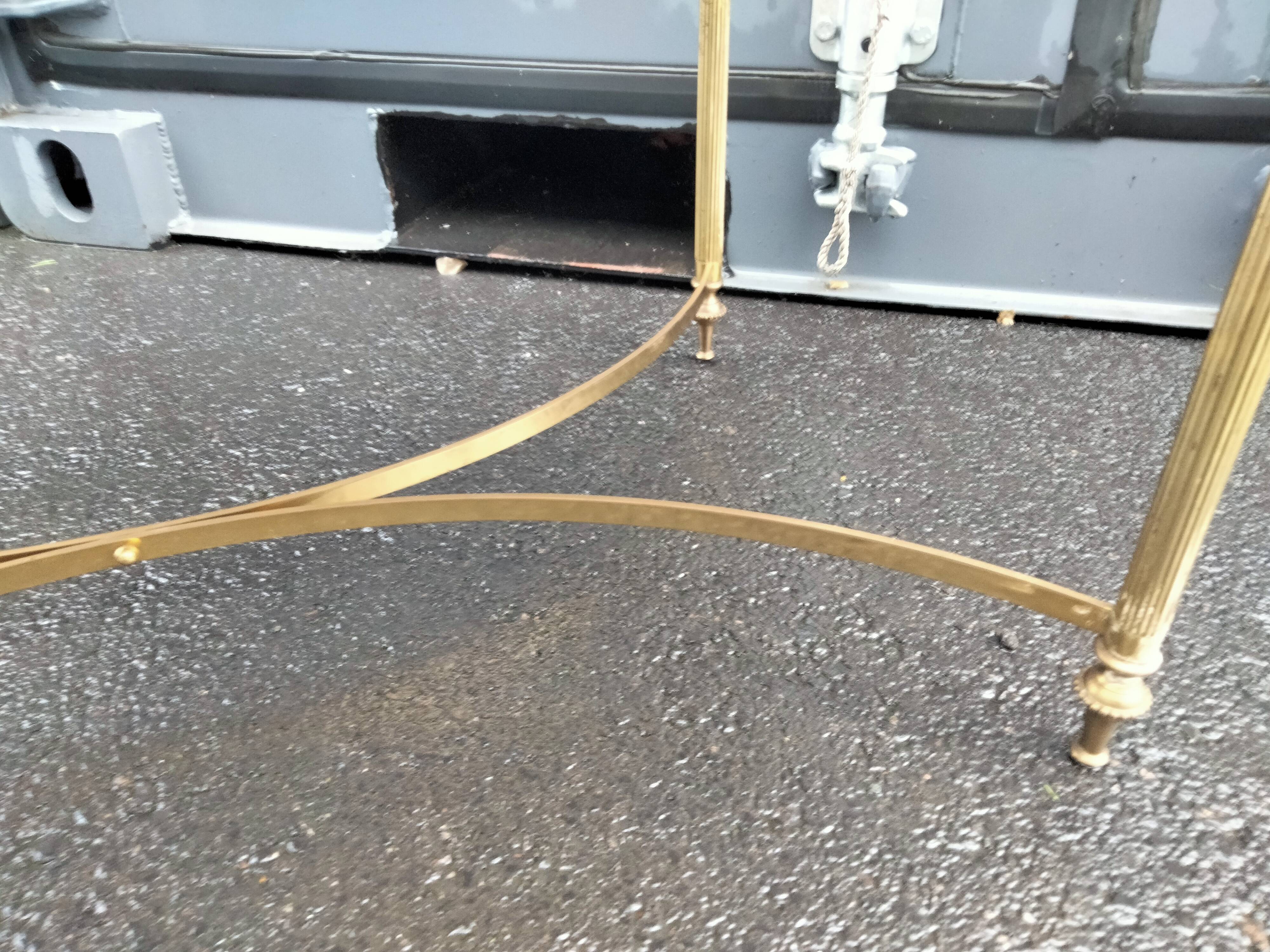 Old vintage gilded side table with marble top