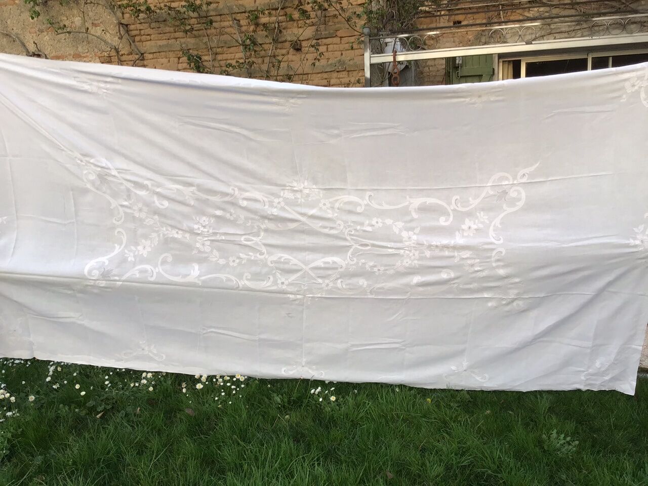 Large white ceremonial tablecloth