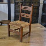 Children's wooden chair with straw seat