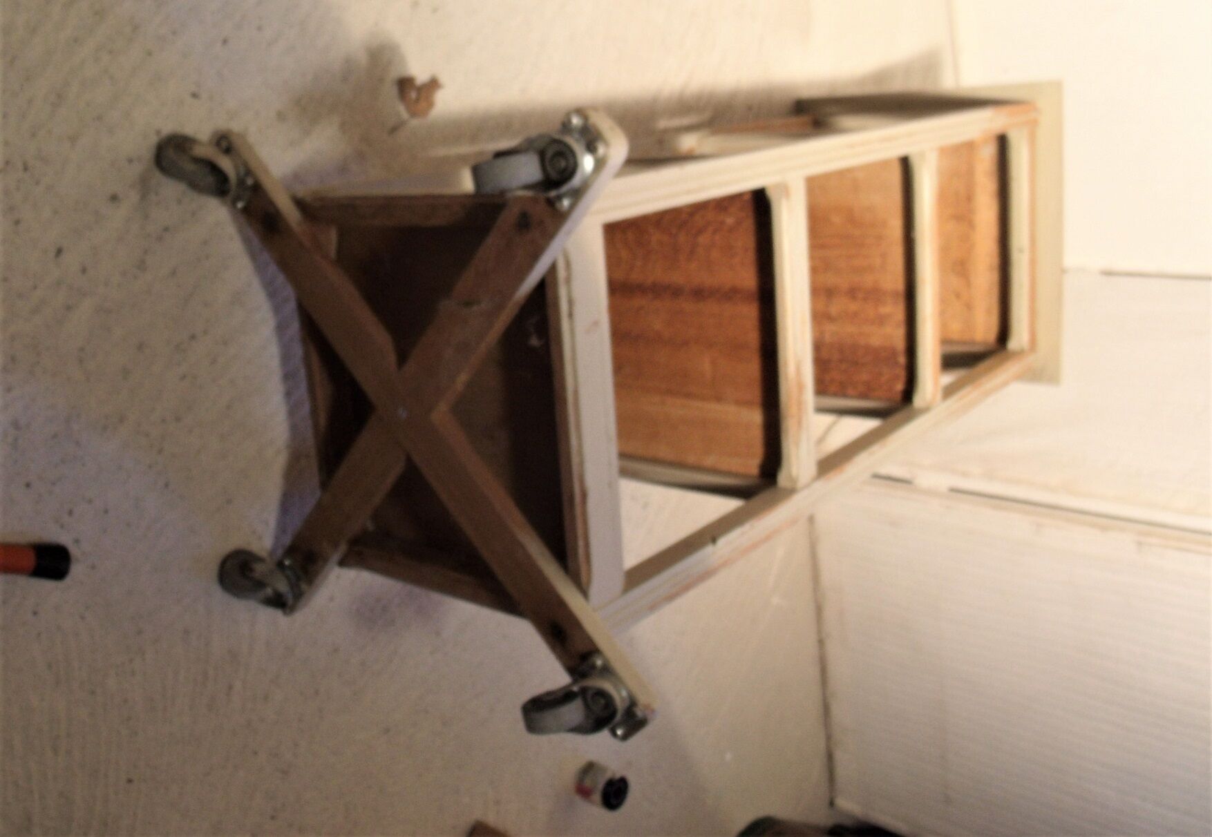 shabby wood side table on wheels