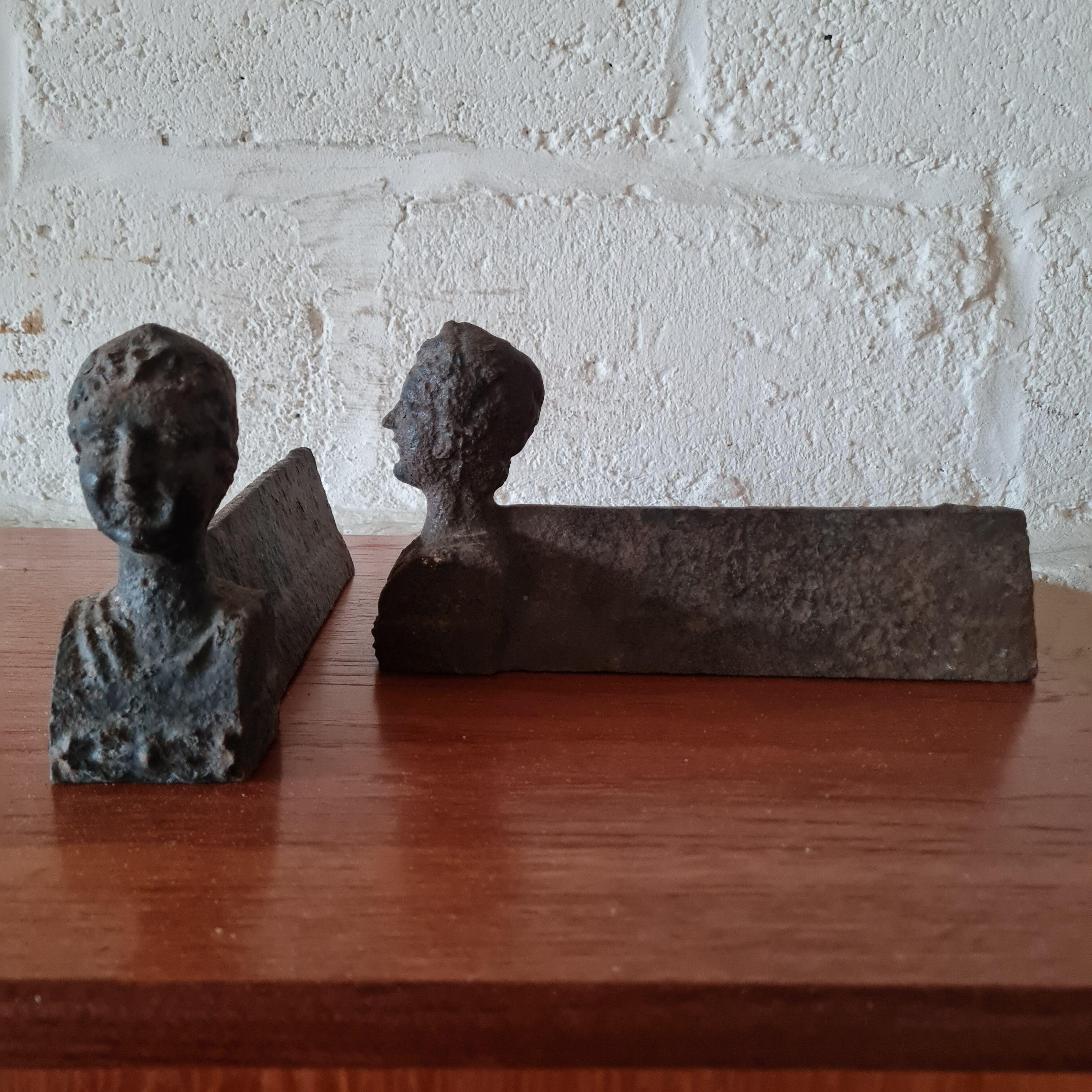 Pair of cast iron chimney covers