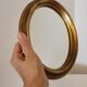 Miroir ovale cadre en bois doré 22 X 17 X 2 cm.