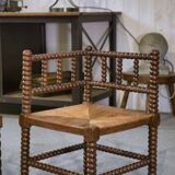 Pair of turned wooden corner chairs from the 1950s.