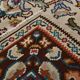 Un tapis persan oriental crème à motifs floraux – Élégance classique