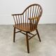 Baumann armchair with Scandinavian style bars, desk