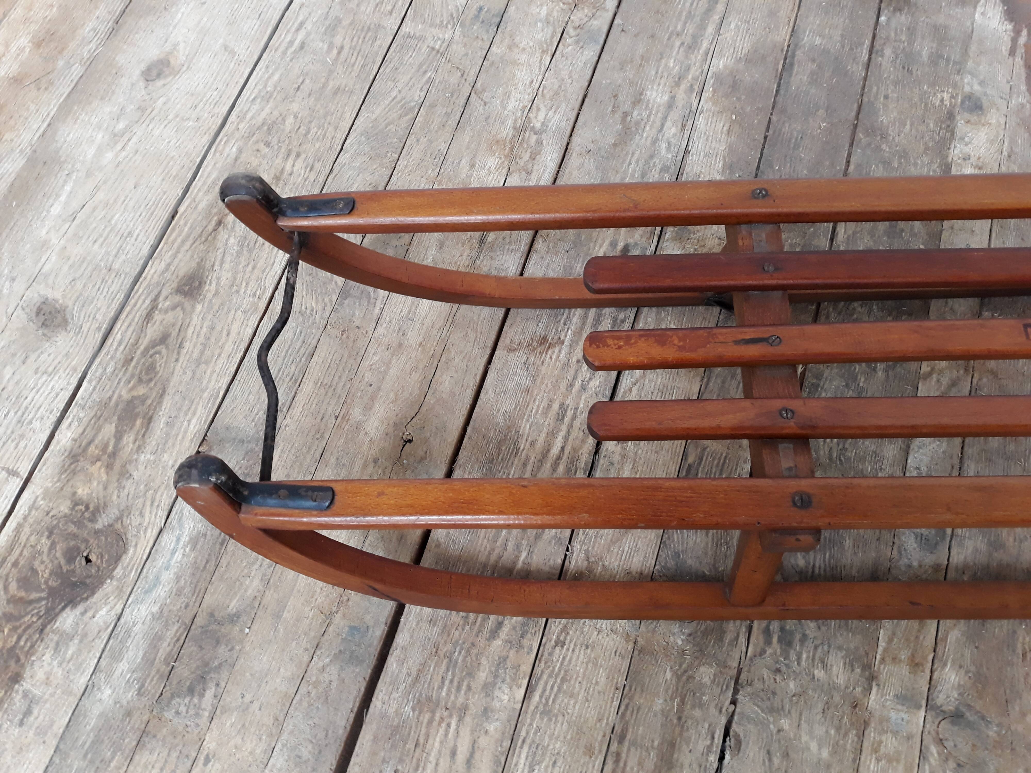 Old vintage wood and metal Davos sledge