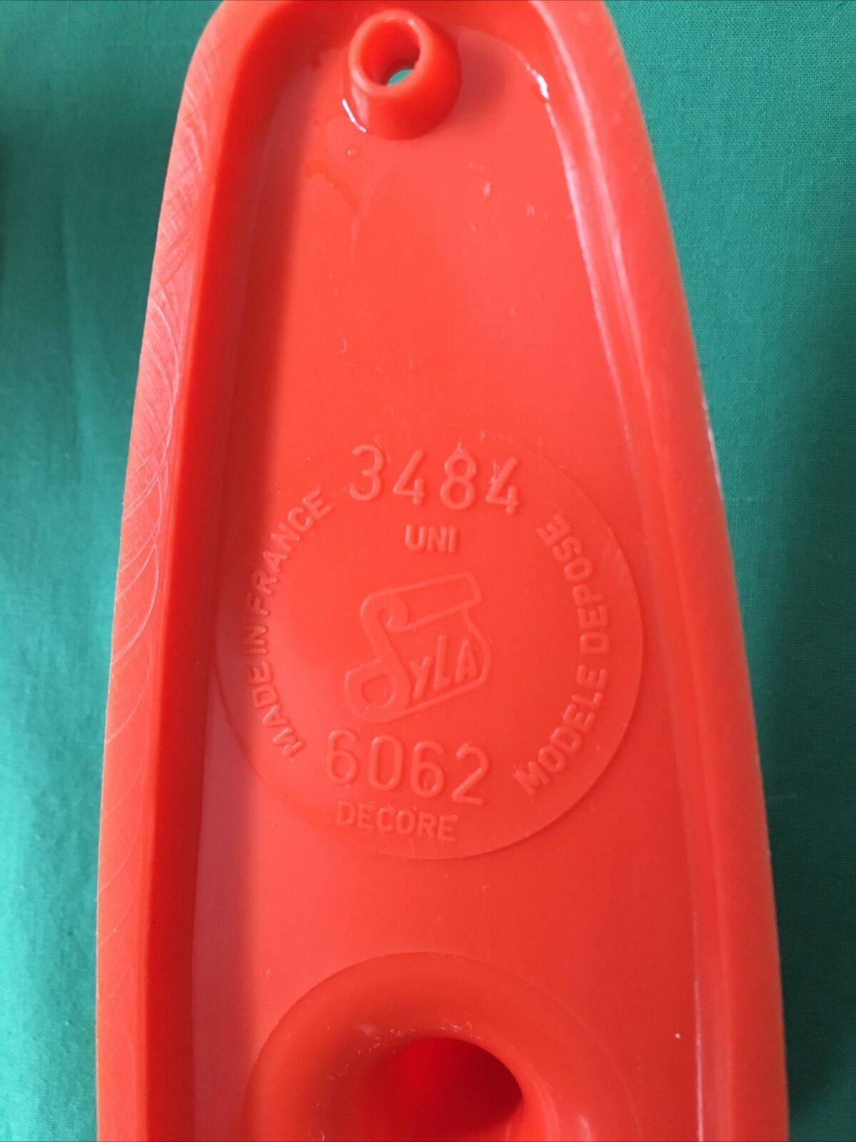 Pair of Patère coat rack Syla France plastic orange design 70s