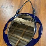 Small round wall mirror in dark blue bakelite 1960