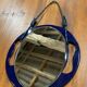 Small round wall mirror in dark blue bakelite 1960