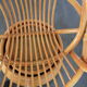 Fauteuil rotin pivotant