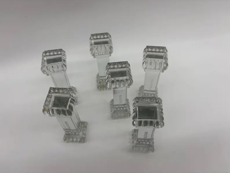 6 Portieux Art Deco knife rests in transparent moulded glass, French glassware from the 1930s.