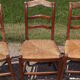 17 old straw chairs