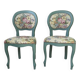 Antique chairs with studded upholstery.