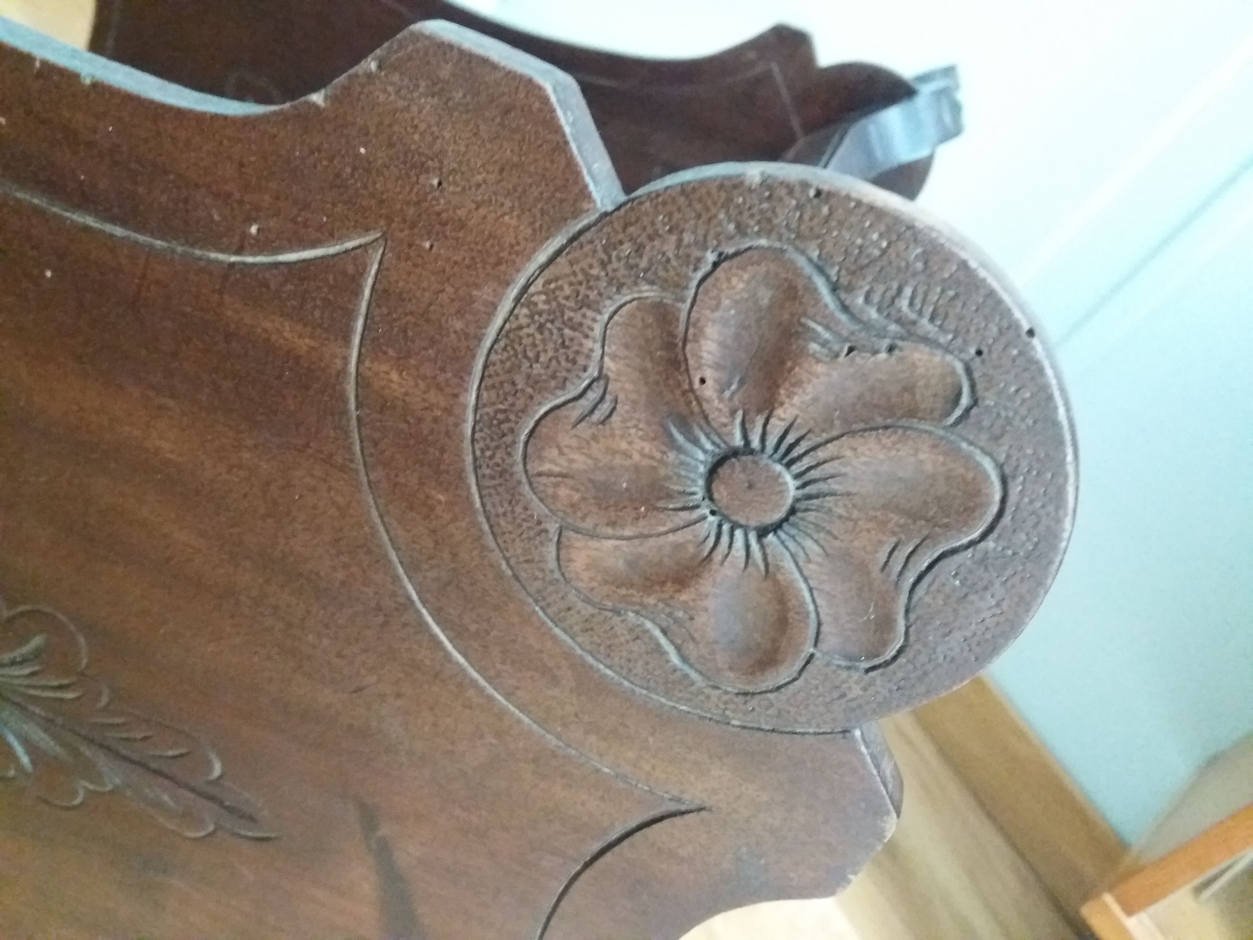 Triplet console harness in carved wood