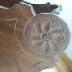 Triplet console harness in carved wood