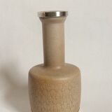 Ceramic vase and money Scandinavian style